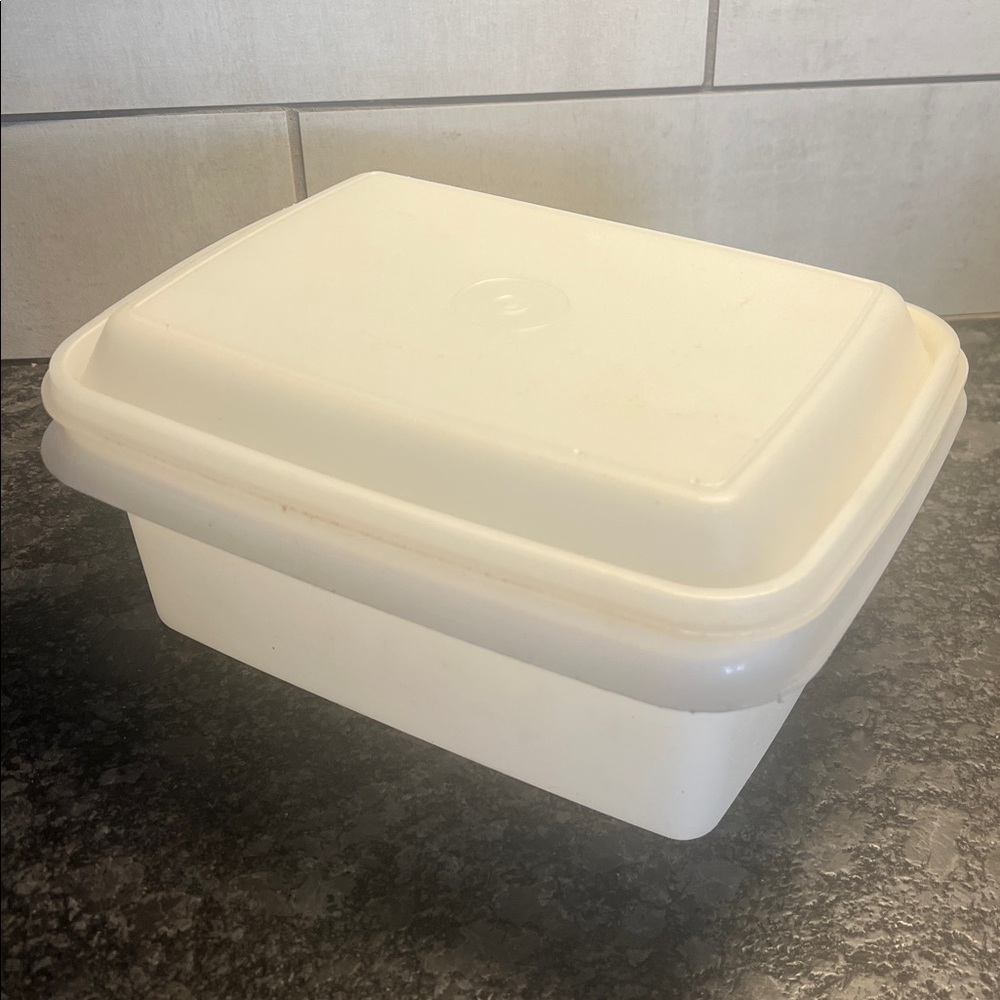 Vintage Tupperware ice cream container This is like brand new. Storage container